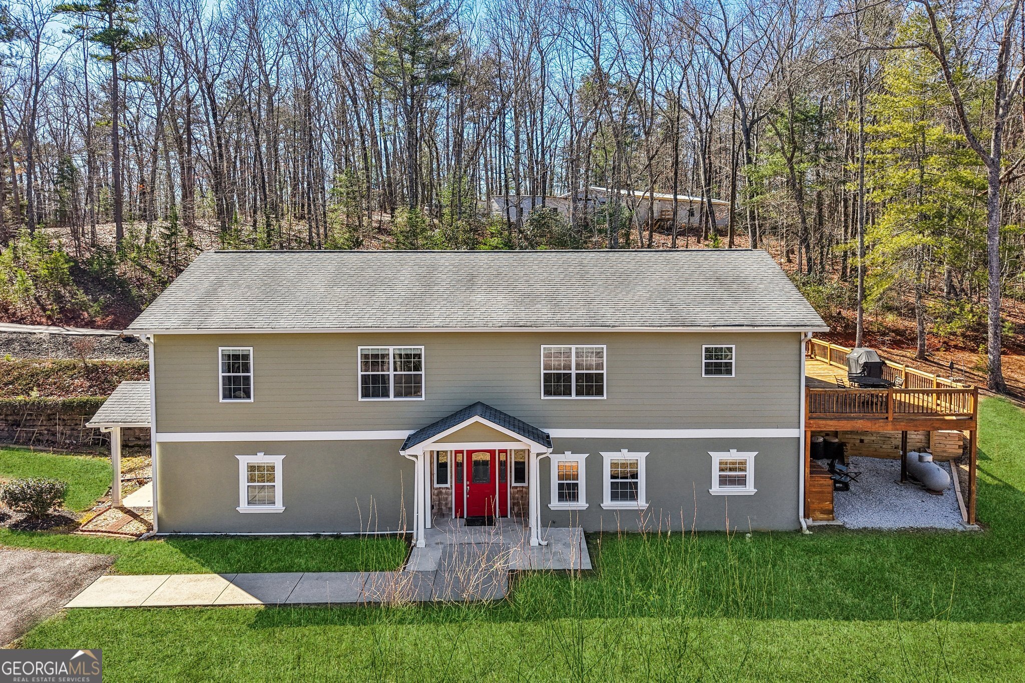 590 Ridge Road Dawsonville, GA 30534 - Photo 62 of 79 a front view of house with yard and green space