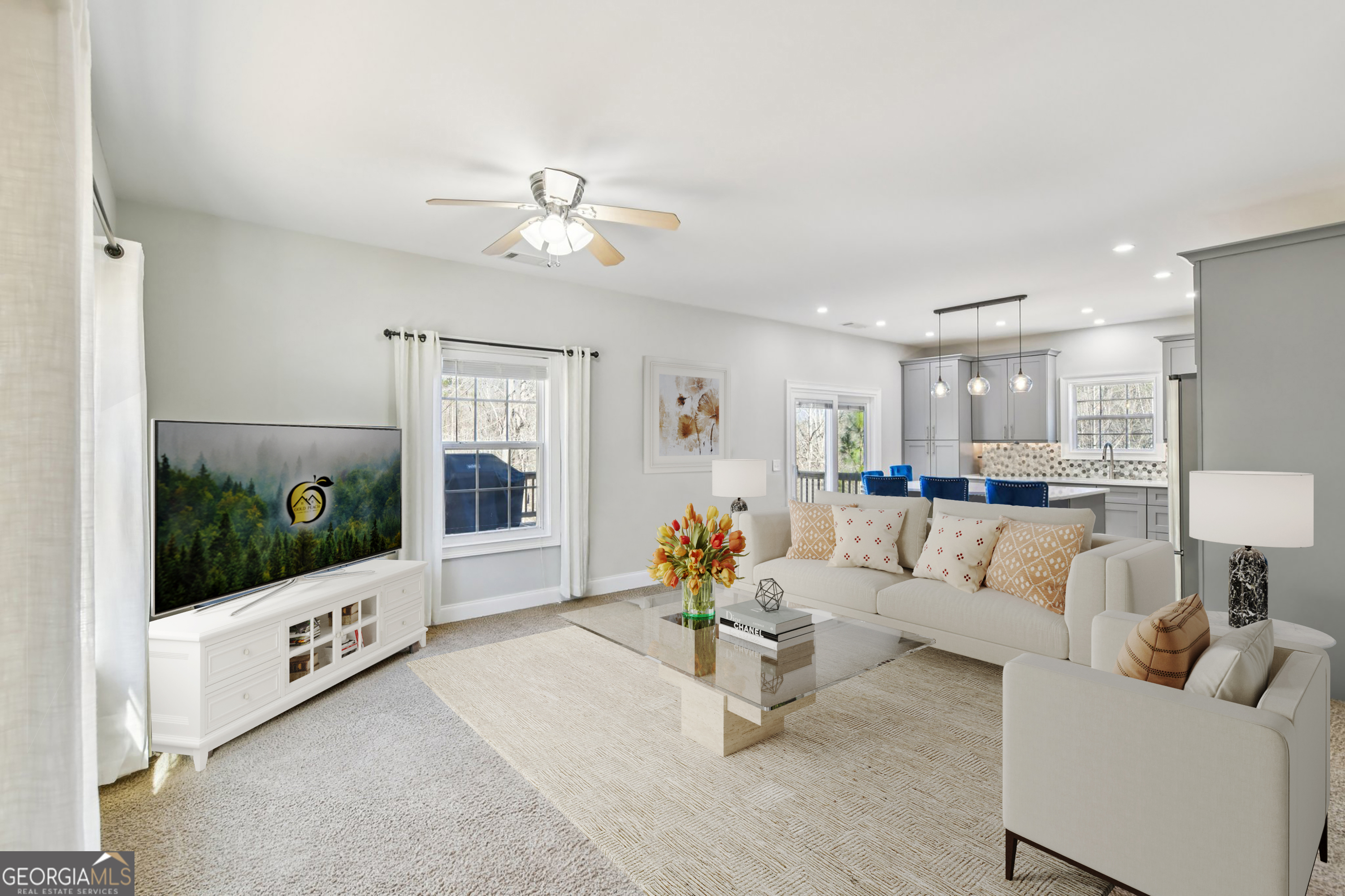 590 Ridge Road Dawsonville, GA 30534 - Photo 8 of 79 a living room with furniture and a flat screen tv