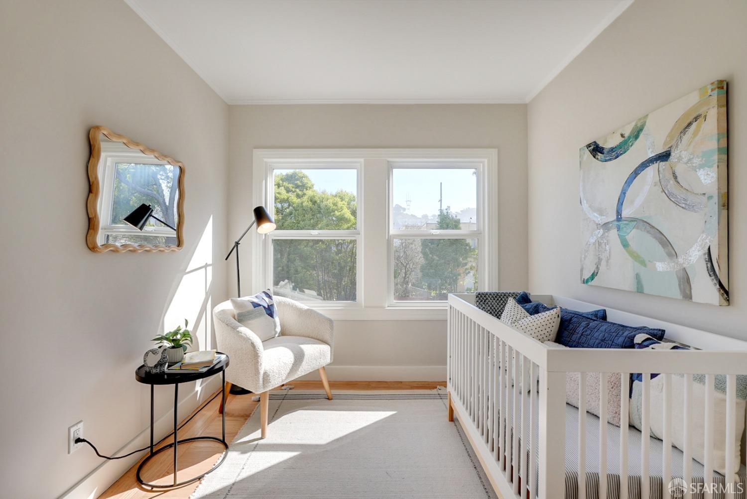 1674 25th Avenue San Francisco, CA 94122 - Photo 20 of 42 a living room with furniture and a window
