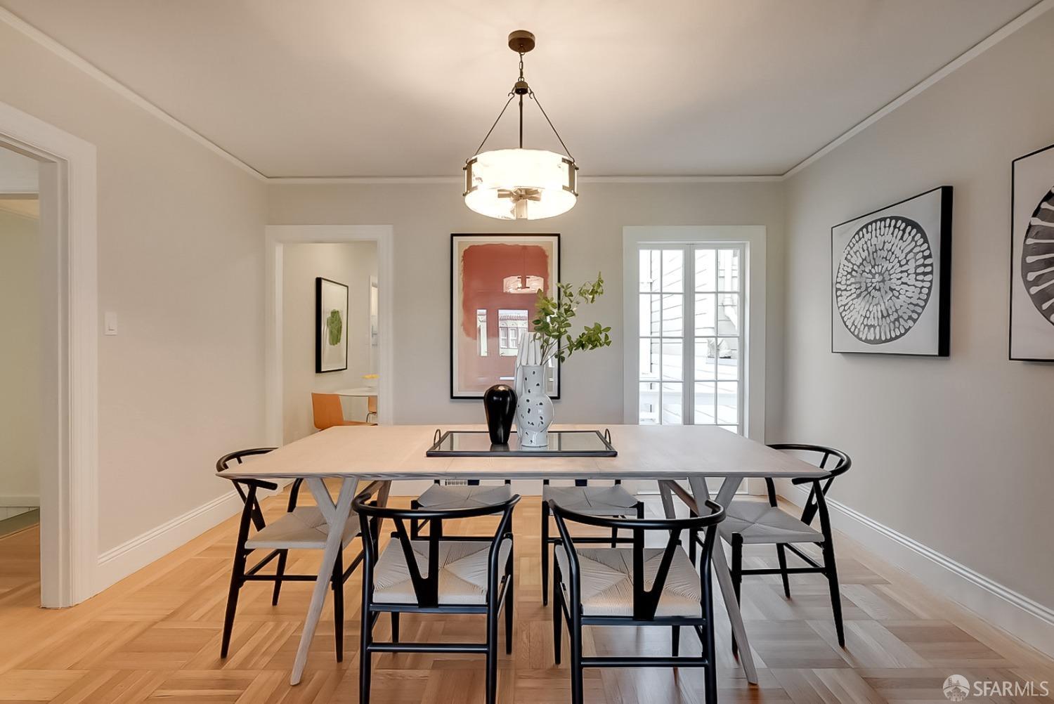 1674 25th Avenue San Francisco, CA 94122 - Photo 5 of 42 a view of a dining room with furniture window and wooden floor