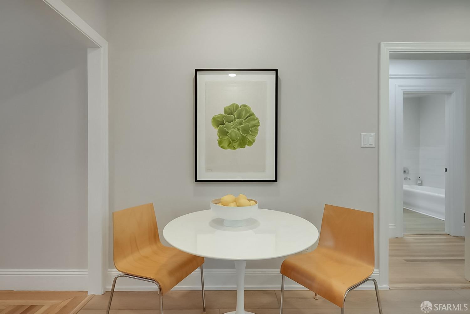 1674 25th Avenue San Francisco, CA 94122 - Photo 7 of 42 a view of a dining room with furniture and wooden floor