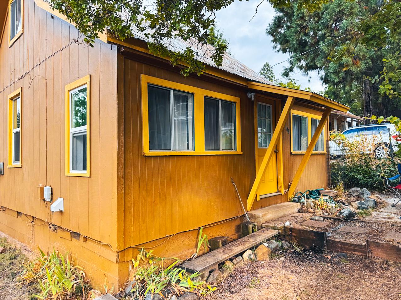 108 Pine Street West Point, CA 95255 - Photo 17 of 17 a view of house with backyard and seating area