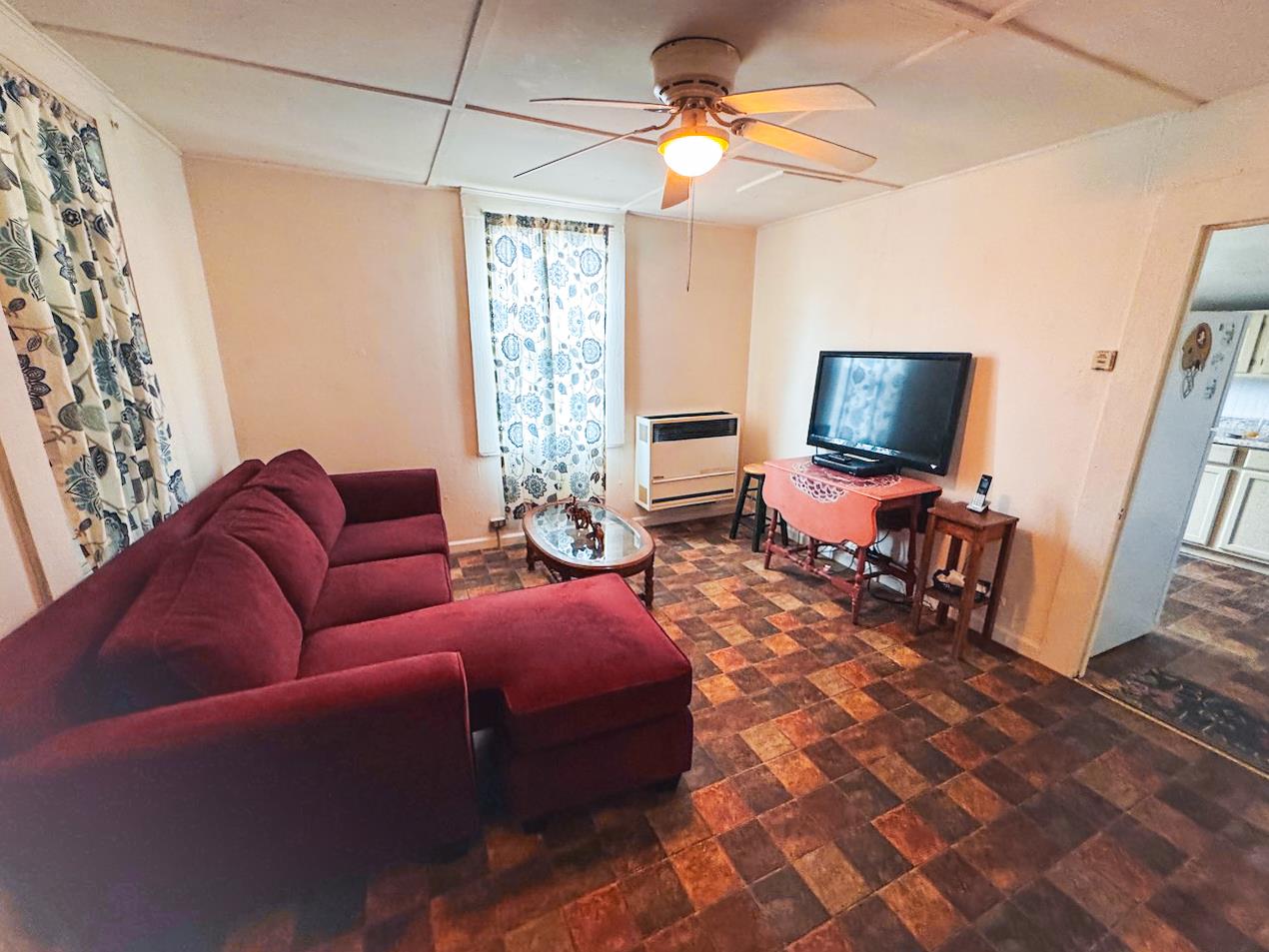 108 Pine Street West Point, CA 95255 - Photo 5 of 17 a living room with furniture a flat screen tv and a window