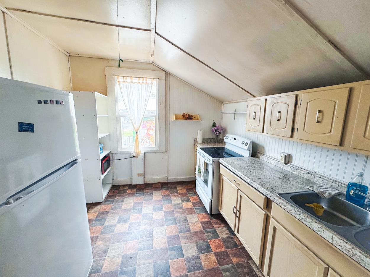 108 Pine Street West Point, CA 95255 - Photo 7 of 17 a kitchen with stainless steel appliances granite countertop a sink stove and refrigerator