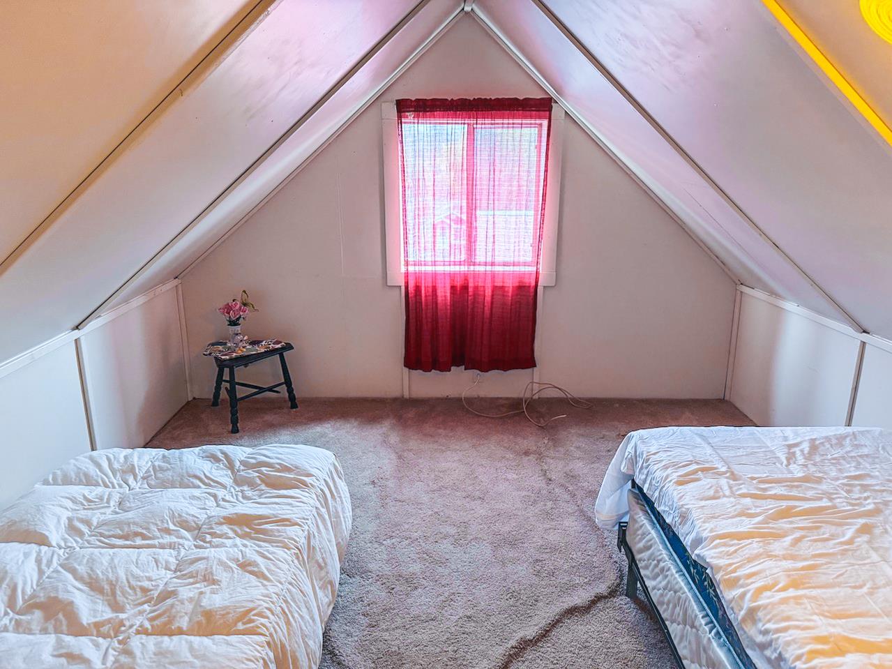 108 Pine Street West Point, CA 95255 - Photo 9 of 17 a bedroom with a bed and a window