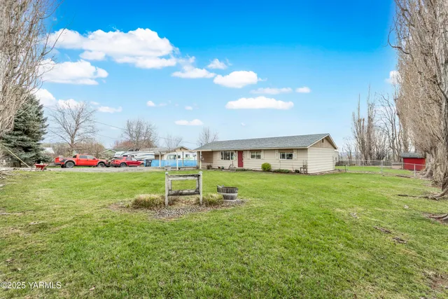 a house with garden in front of it