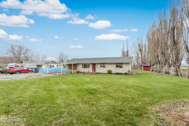 a aerial view of a house and garden