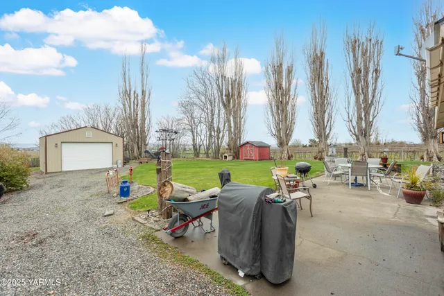 a view of a table and chairs in patio