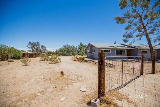 2030 South Inyo Street Ridgecrest, CA 93555 - Photo 2 of 42 a view of a house with a yard
