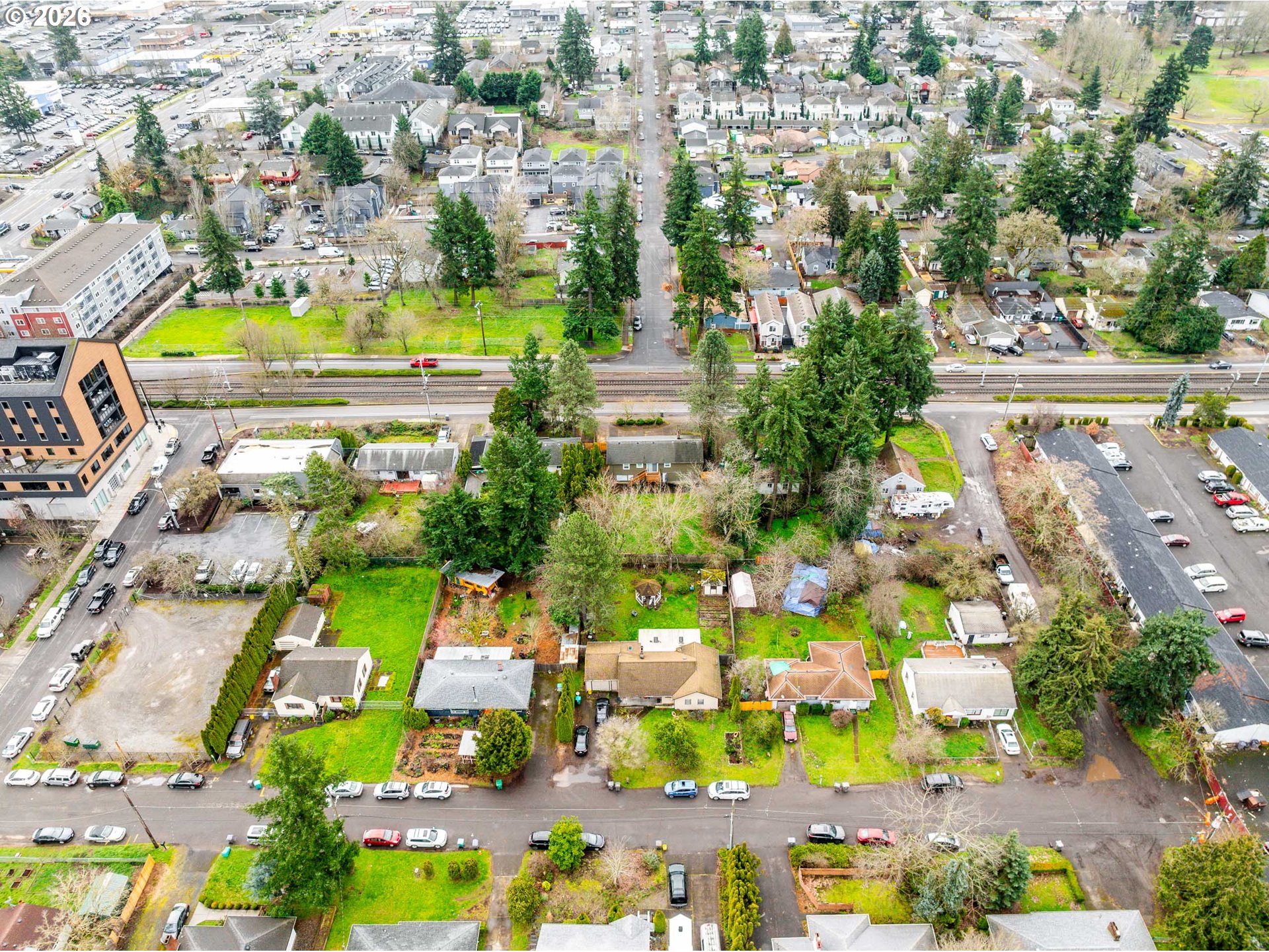 East Burnside Street Portland, OR 97220 - Photo 9 of 25 an aerial view of residential houses with outdoor space and parking