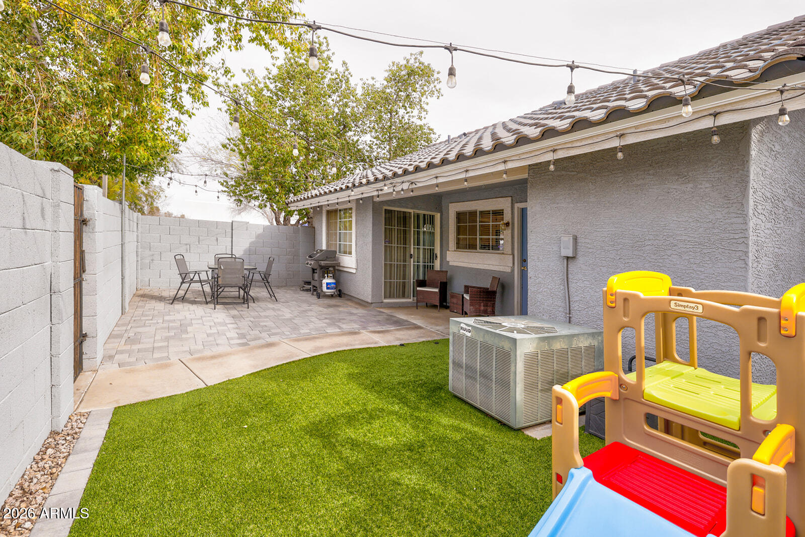 860 North McQueen Road, Unit 1007 Chandler, AZ 85225 - Photo 16 of 19 Updated Backyard