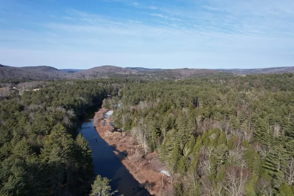 a view of a lake with a mountain in the background