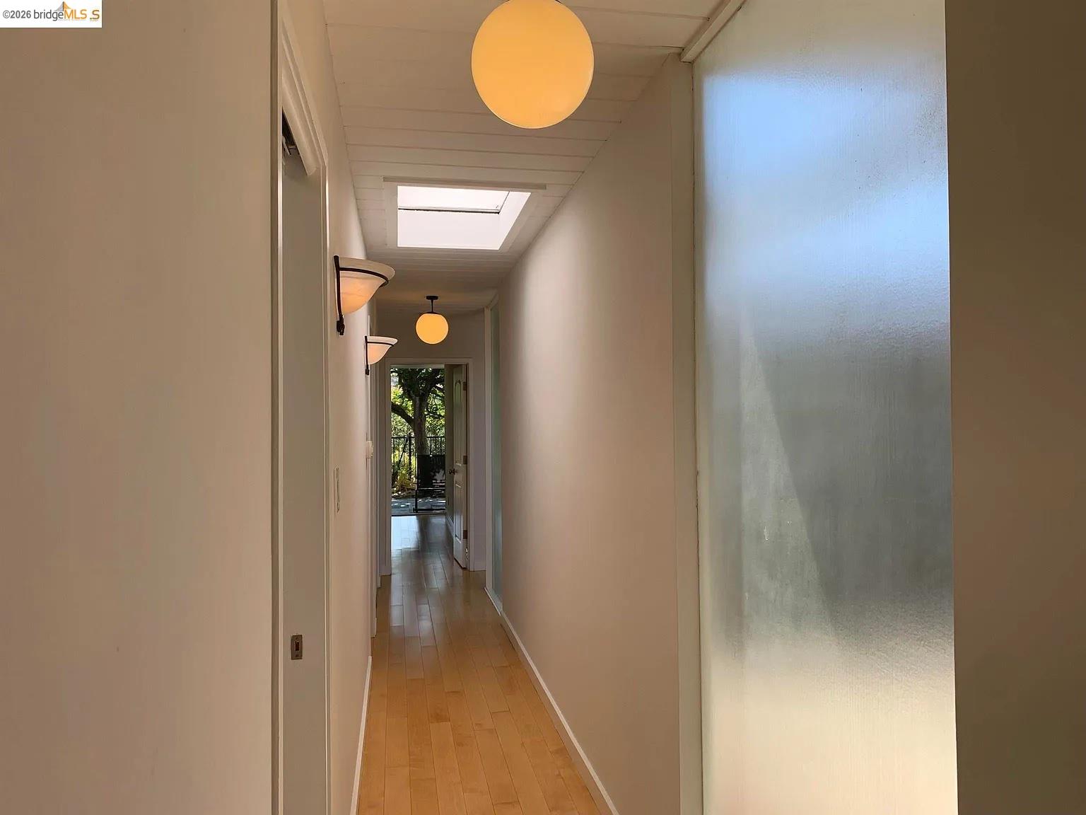5559 Greenridge Road Castro Valley, CA 94552 - Photo 12 of 33 Hall featuring baseboards and light wood-style floors