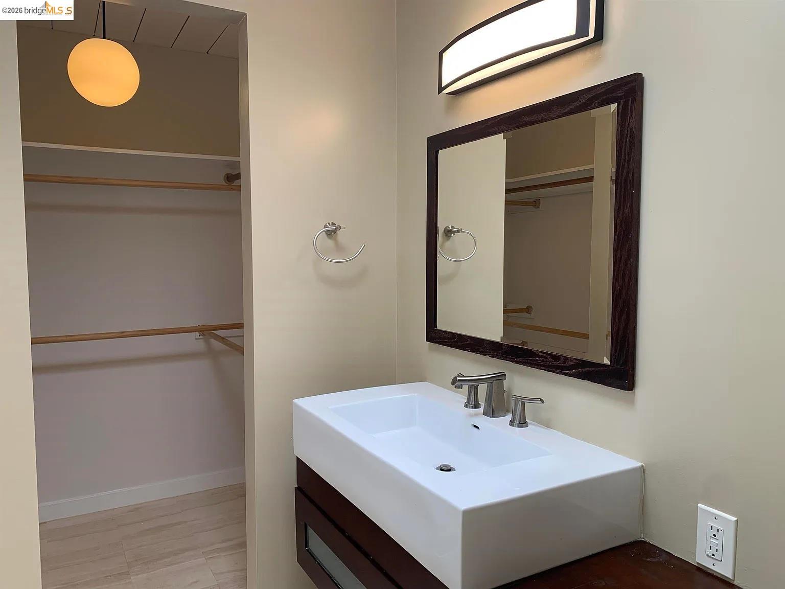 5559 Greenridge Road Castro Valley, CA 94552 - Photo 16 of 33 Bathroom featuring vanity and a spacious closet