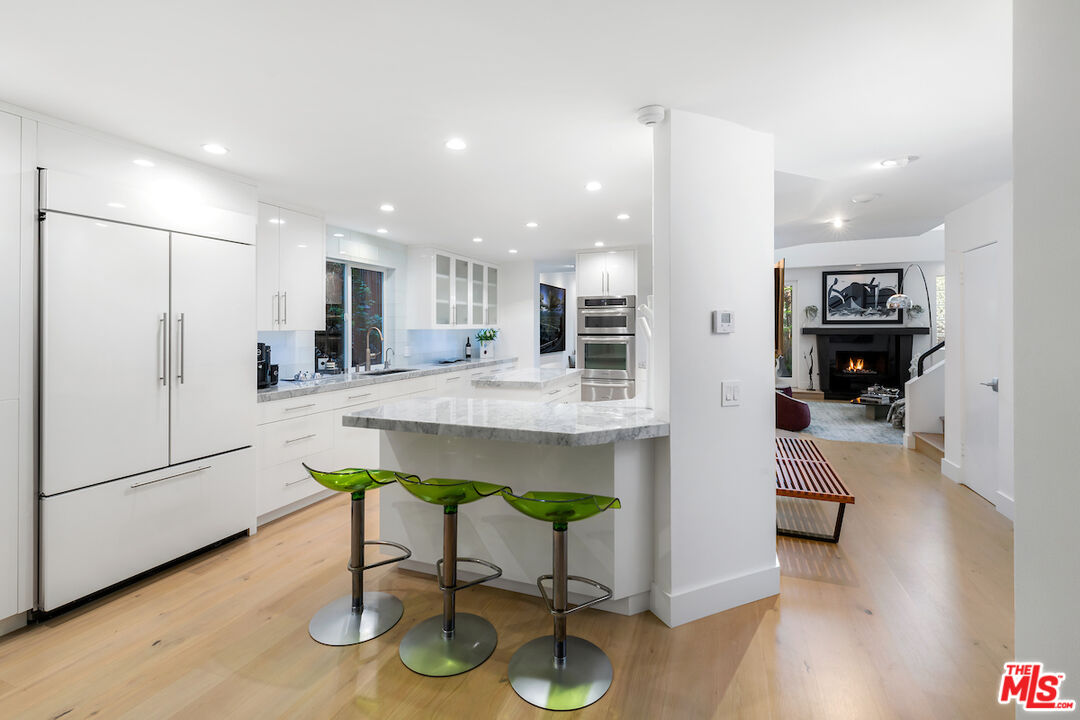 135 Mast Mall Marina del Rey, CA 90292 - Photo 11 of 32 a living room with stainless steel appliances kitchen island granite countertop furniture and a kitchen view