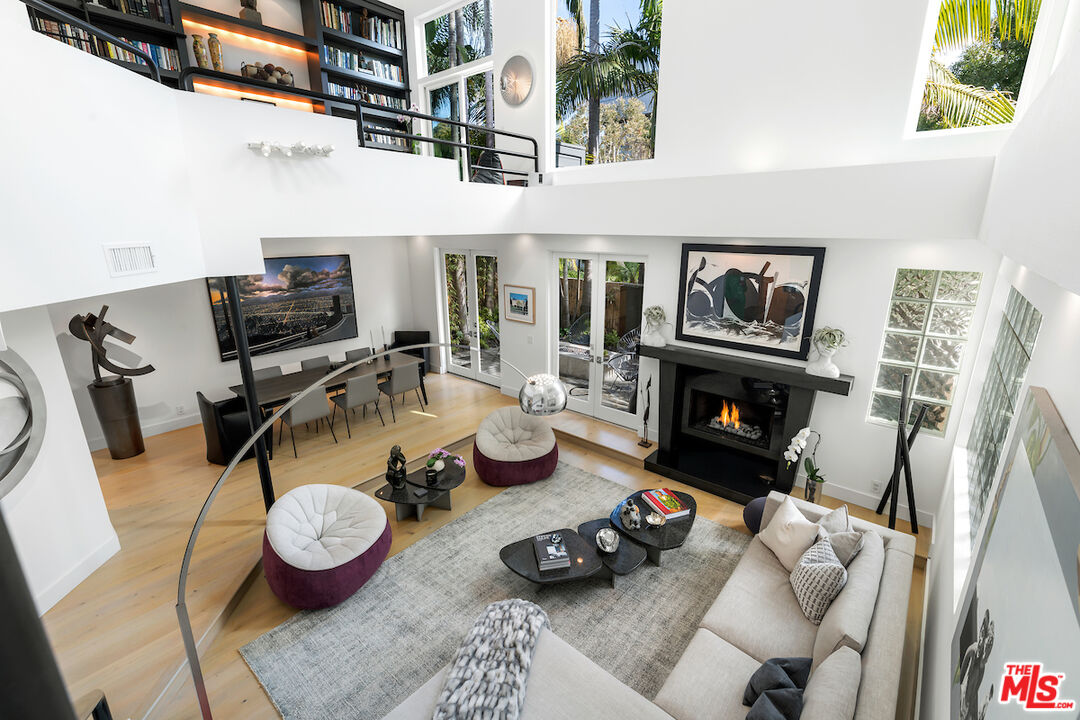 135 Mast Mall Marina del Rey, CA 90292 - Photo 15 of 32 a room with furniture and a fireplace