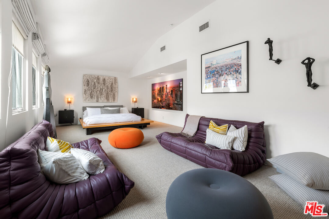 135 Mast Mall Marina del Rey, CA 90292 - Photo 20 of 32 a living room with furniture and wall paintings