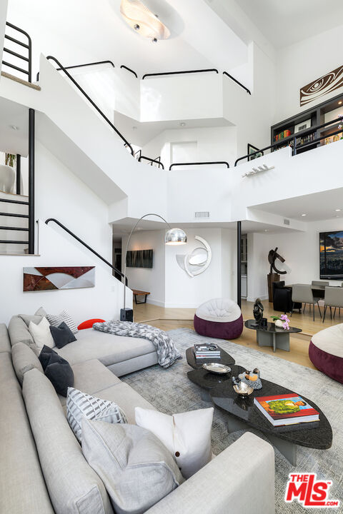 135 Mast Mall Marina del Rey, CA 90292 - Photo 2 of 32 a living room with furniture and wooden floor