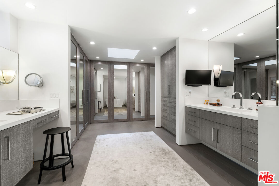 135 Mast Mall Marina del Rey, CA 90292 - Photo 22 of 32 a spacious bathroom with a double vanity sink a mirror and a shower