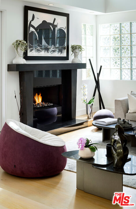 135 Mast Mall Marina del Rey, CA 90292 - Photo 5 of 32 a living room with furniture and a fireplace