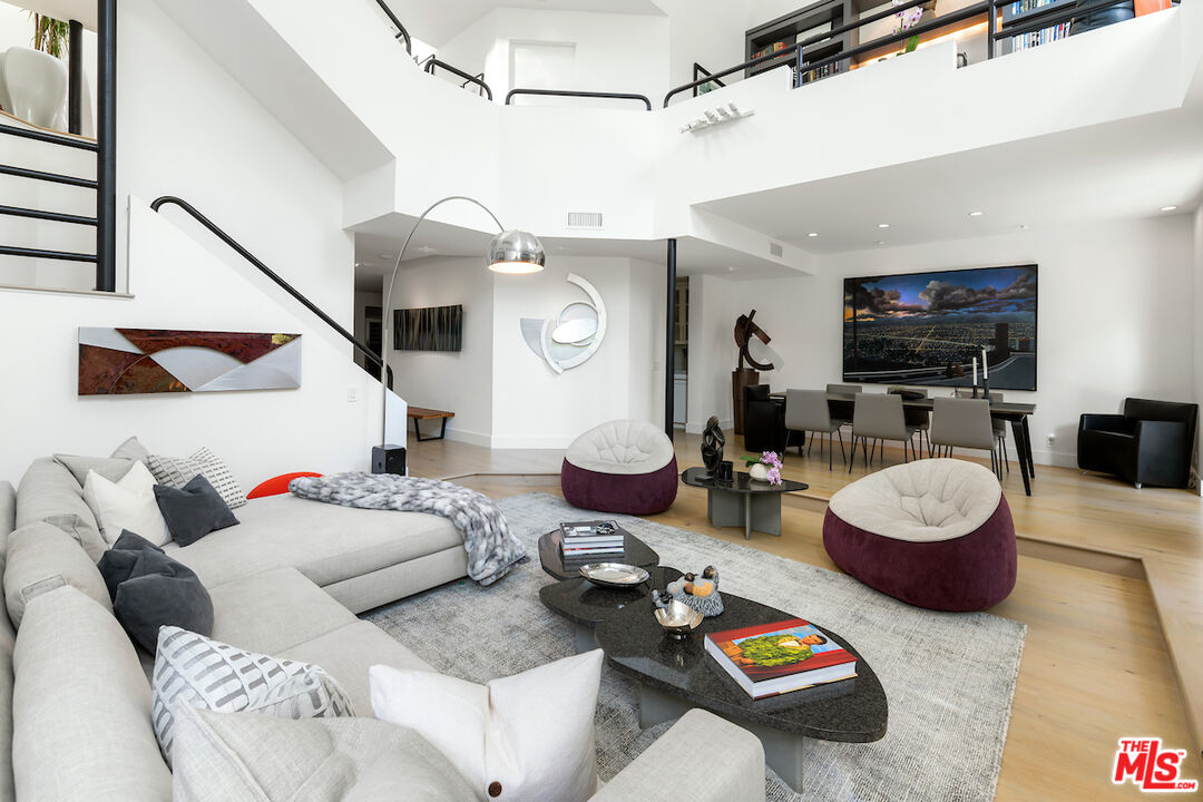 135 Mast Mall Marina del Rey, CA 90292 - Photo 7 of 32 a living room with furniture and a flat screen tv