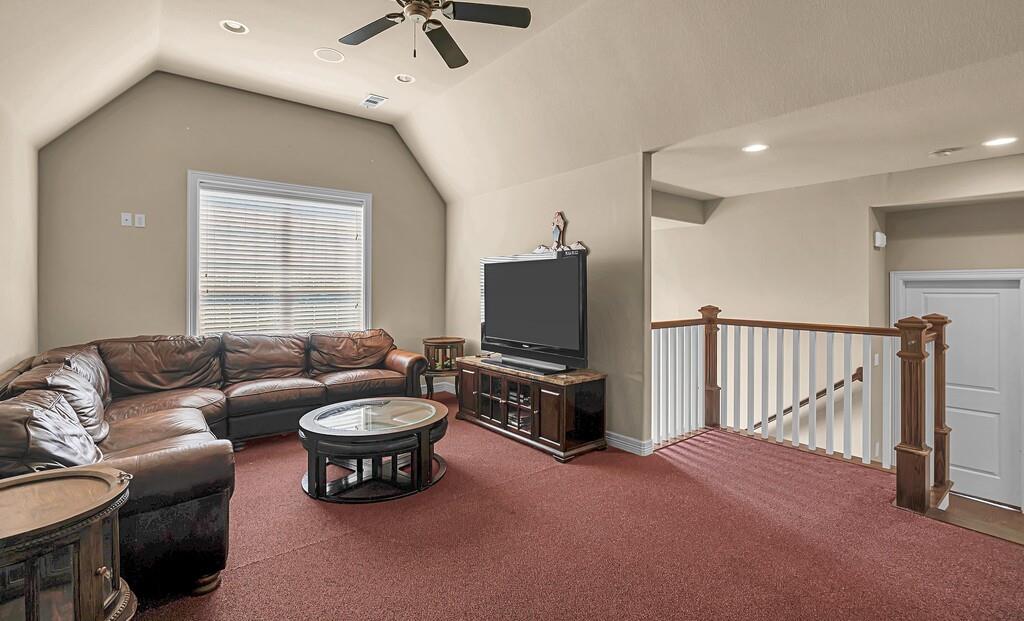 74 Independence Trail Waco, TX 76708 - Photo 29 of 40 a living room with furniture and a flat screen tv
