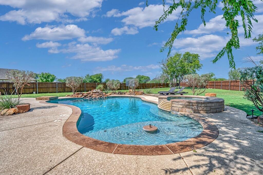 74 Independence Trail Waco, TX 76708 - Photo 37 of 40 a view of a swimming pool with a patio