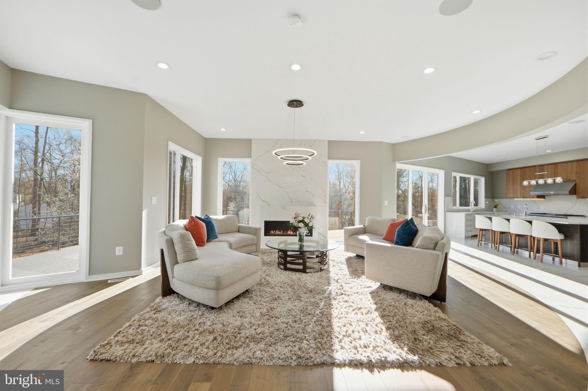 2368 Hunter Mill Road Vienna, VA 22181 - Photo 12 of 74 a living room with furniture and a large window
