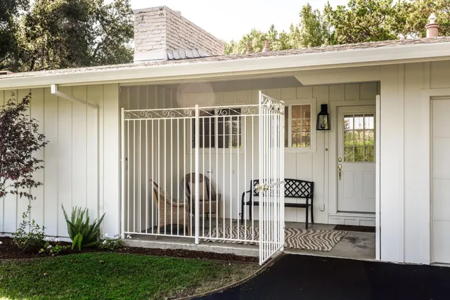 a view of a porch with a chair