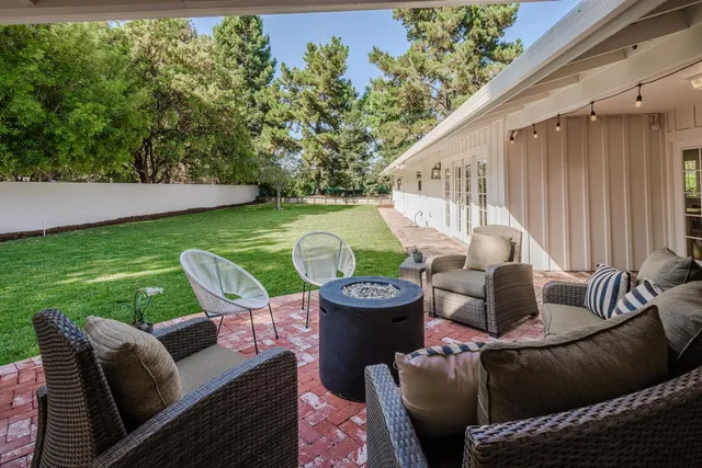 a outdoor living space with furniture and garden