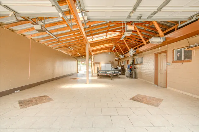 a view of a garage with wooden floor