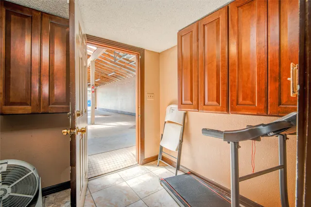 a view of an entryway with a door