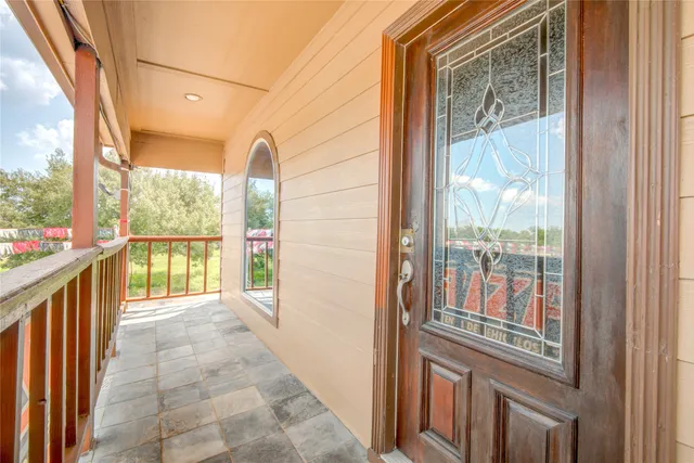 a view of a room with a large window