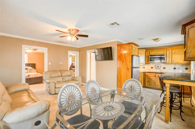 a view of a dining room with furniture