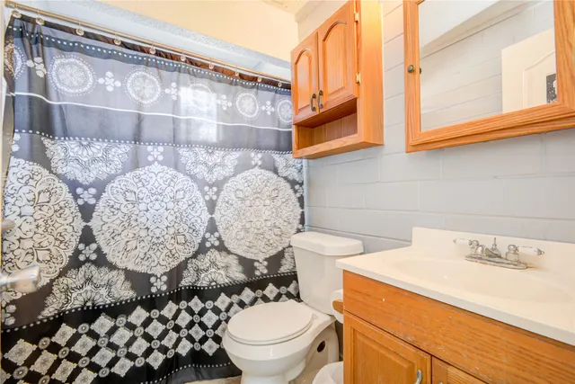 a bathroom with a sink and a toilet