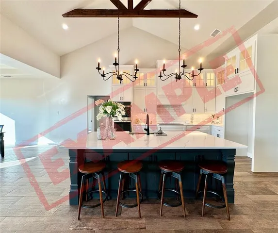 a view of a bedroom with a large window