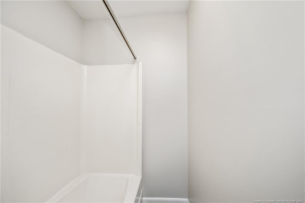 4305 Rosehill Road, Unit D D Fayetteville, NC 28311 - Photo 5 of 10 a bathroom with a bathtub