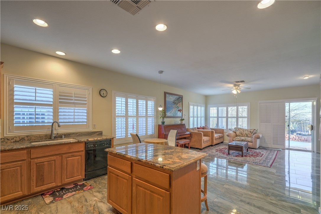 3002 Hickory Valley Road Henderson, NV 89052 - Photo 15 of 58 ISLAND KITCHEN BOASTS GRANITE COUNTERTOPS,
NOOK, PANTRY, RECESSED LIGHTING,
REFRIGERATOR, B/I OVEN, STOVE W/ DOUBLE
OVEN, GAS COOKTOP, DISHWASHER, AND
MICROWAVE