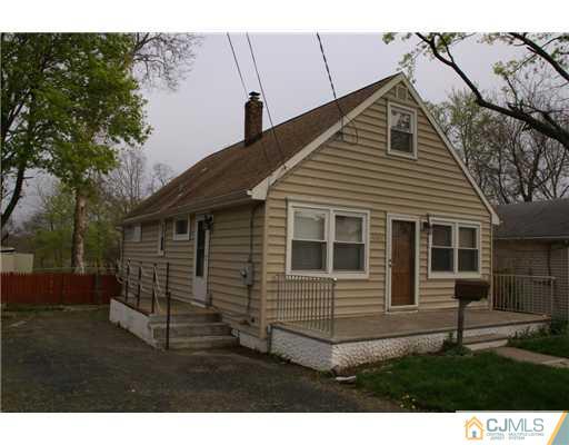 495 Harding Road Old Bridge, NJ 08879 - Photo 1 of 11 a view of a house with a yard