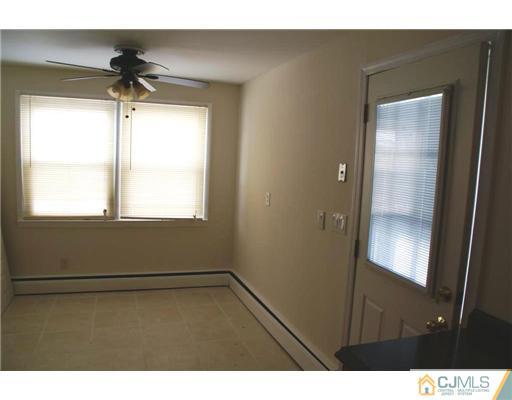 495 Harding Road Old Bridge, NJ 08879 - Photo 3 of 11 a view of an empty room with a window