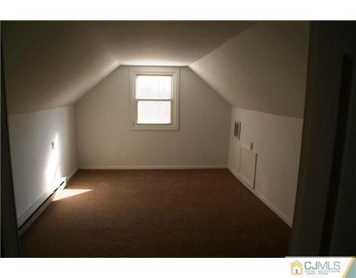 495 Harding Road Old Bridge, NJ 08879 - Photo 8 of 11 a view of an empty room and window