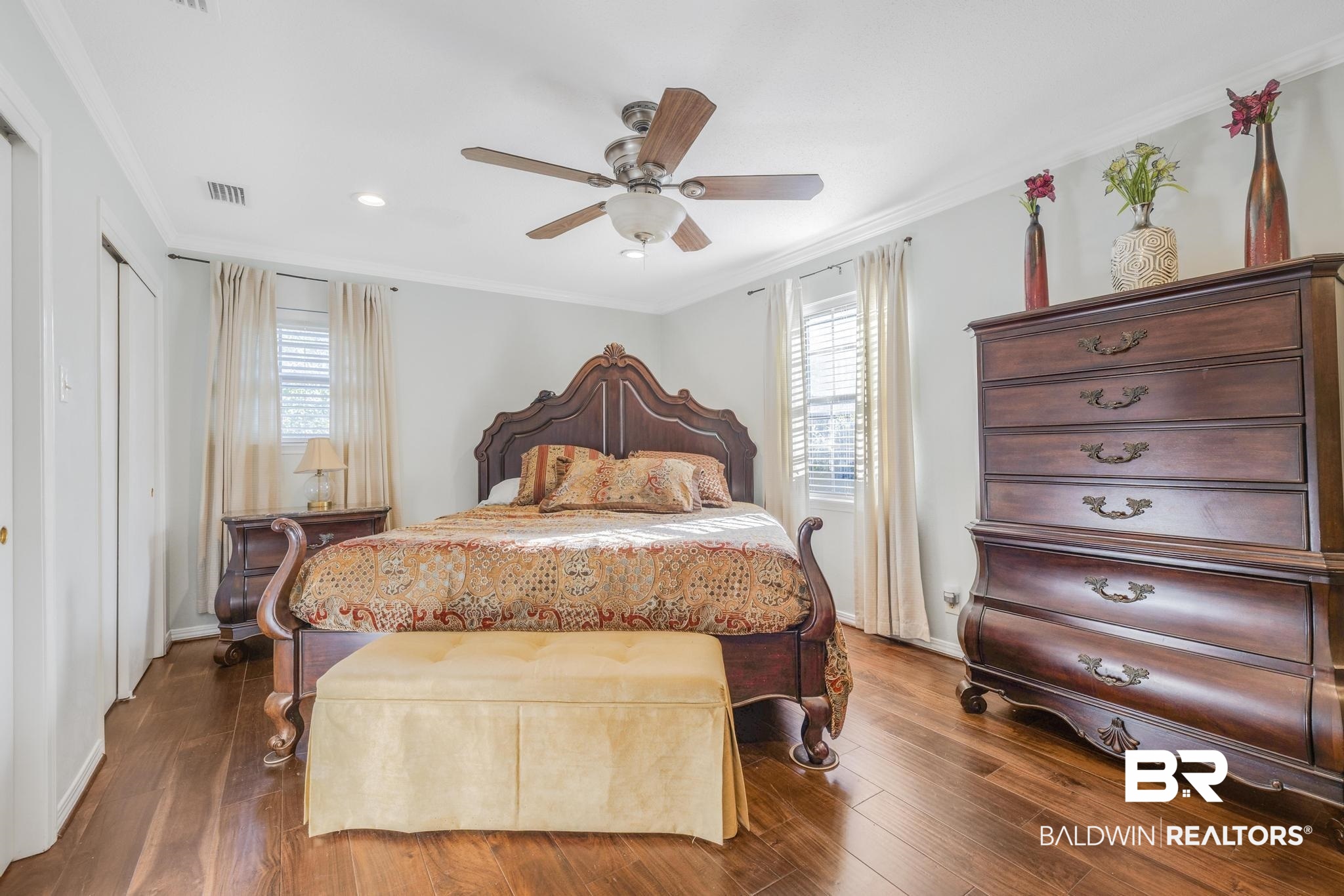 2573 E Road Mobile, AL 36693 - Photo 17 of 45 Bedroom featuring crown molding, dark wood finished floors, multiple windows, ceiling fan, and recessed lighting