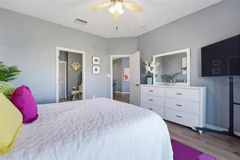 a bathroom with a sink and mirror with toilet
