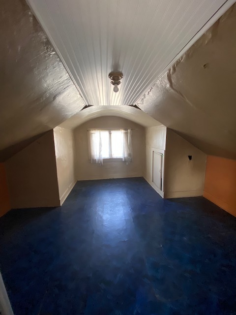 3019 North Kenneth Avenue Chicago, IL 60641 - Photo 18 of 21 an empty room with wooden floor and windows