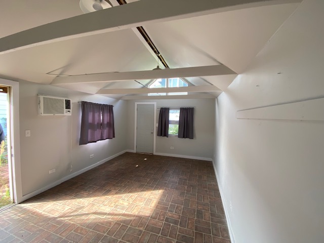 3019 North Kenneth Avenue Chicago, IL 60641 - Photo 21 of 21 a view of an empty room with a window