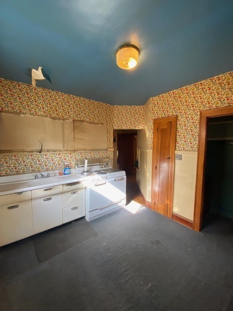 3019 North Kenneth Avenue Chicago, IL 60641 - Photo 9 of 21 a bathroom with a granite countertop sink and a mirror