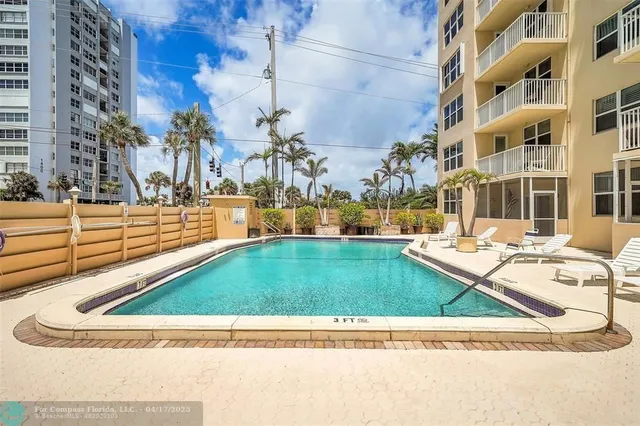 a view of a lake with a big yard