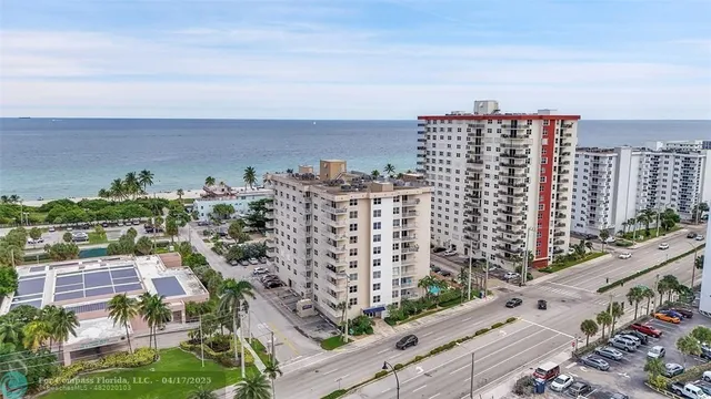 a view of city with ocean