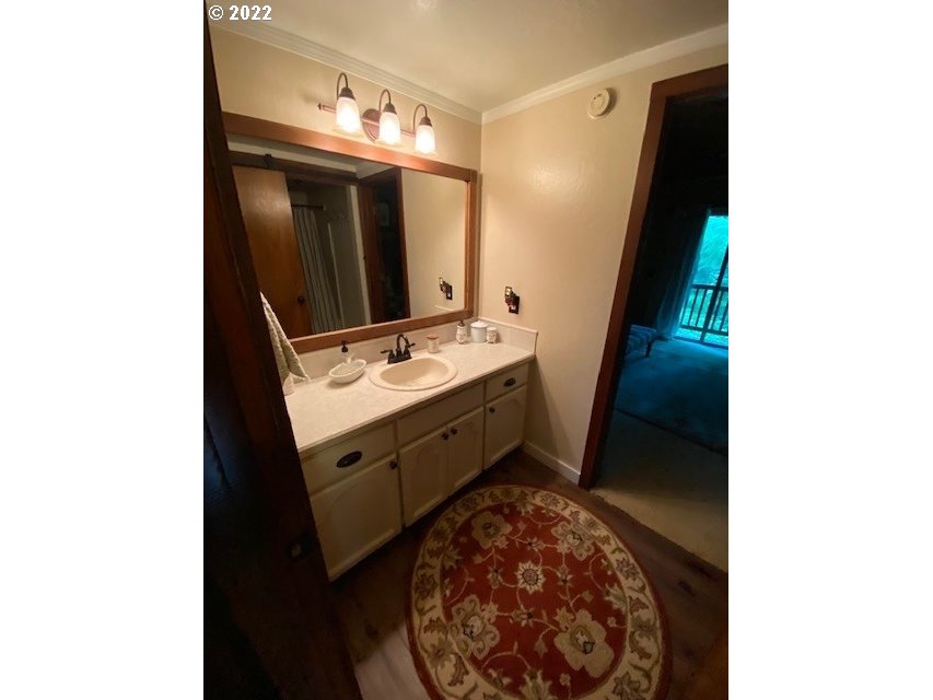 41945 Southeast Dover Court Sandy, OR 97055 - Photo 12 of 32 a bathroom with a sink and mirror