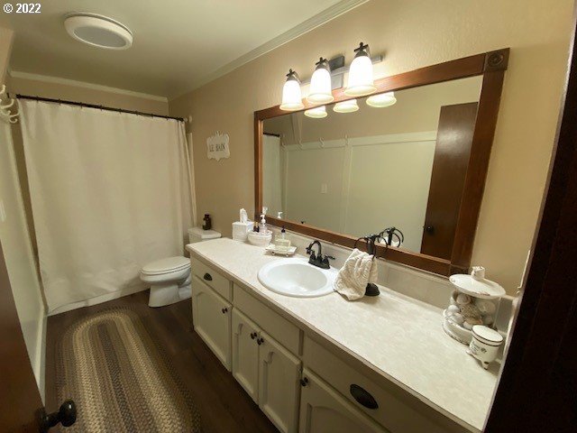 41945 Southeast Dover Court Sandy, OR 97055 - Photo 17 of 32 a bathroom with a double vanity sink mirror and toilet
